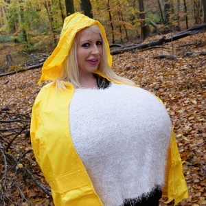Beshine and the biggest breast ever during a rain shower