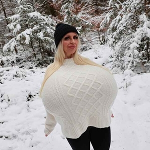 Fun in the snow with the worlds largest and heaviest enhanced breasts 