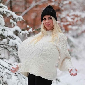 Fun in the snow with the worlds largest and heaviest enhanced breasts 