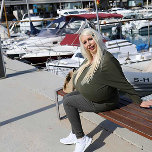 Beshine and the largest enhanced breasts in the world at Port Adriano