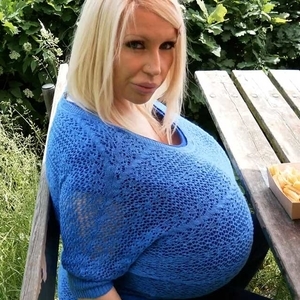 Hotdogs, chips and the worlds biggest breasts are a very tempting combination