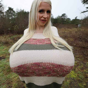Worlds biggest breasted woman Beshine is stretching her cozy sweater