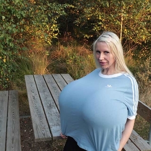 Beshine and her worlds largest breasts take a little break at a resting place